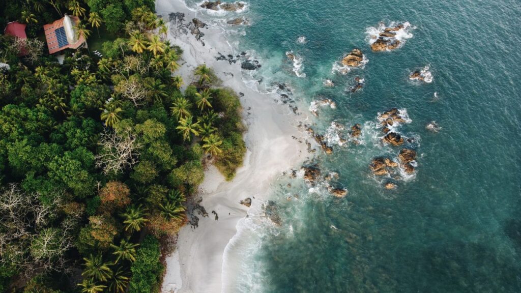 Aerial view capturing the secluded beauty of Montezuma Beach, one of the best beaches in Costa Rica