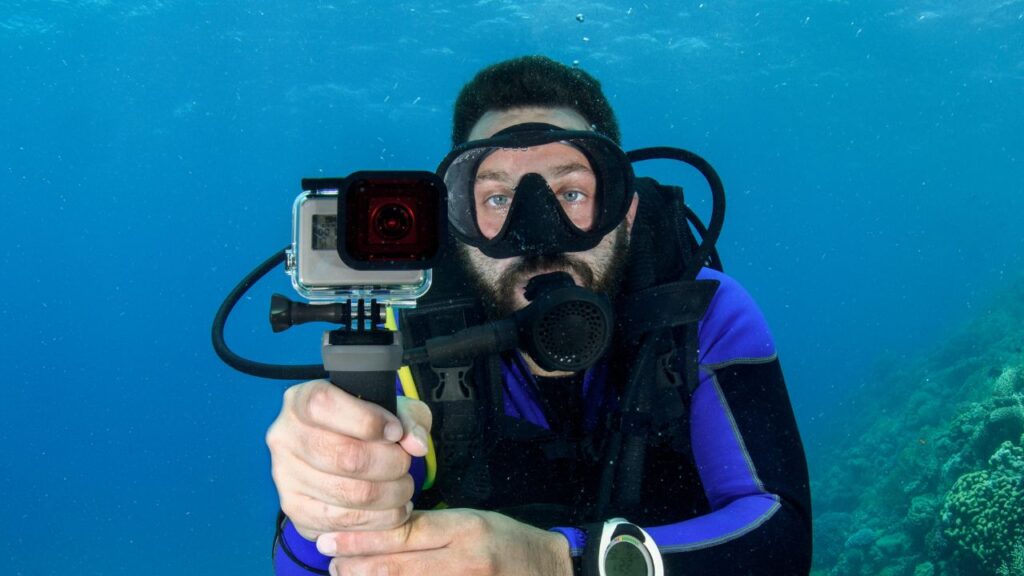 Diver exploring the vibrant underwater realms during a Costa Rica scuba diving excursion.